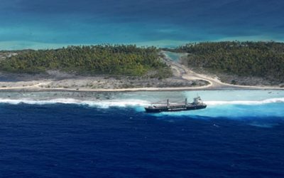 Large cargo ship runs aground on French Polynesia reef